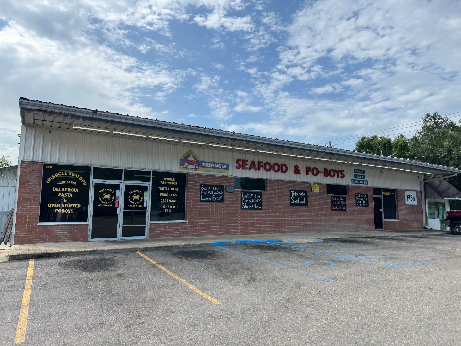 Triangle Seafood & Po-Boys storefront on Hardy Street in Hattiesburg, Mississippi